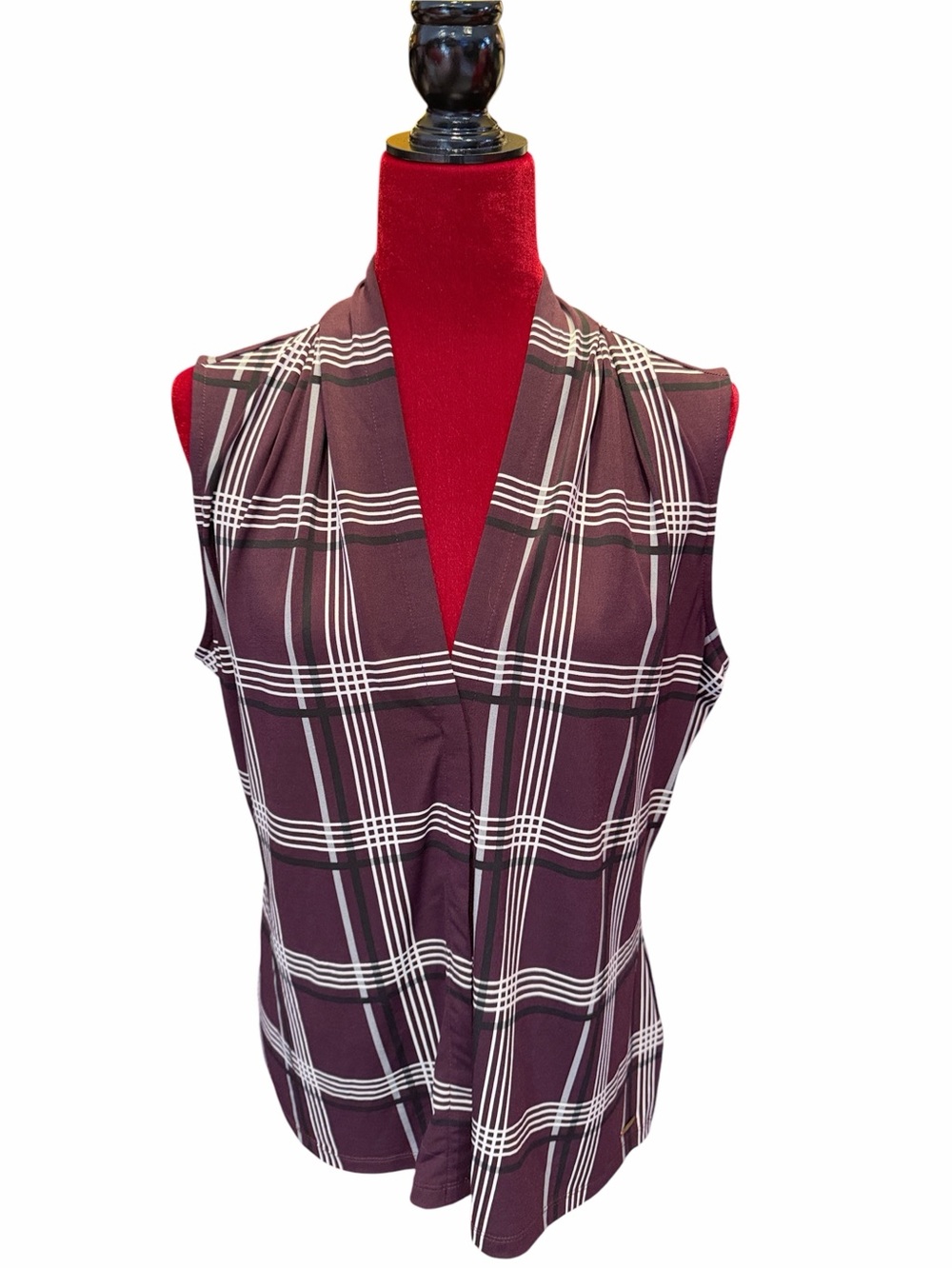 #732.  4/$32. Calvin sleeveless blouse. Large